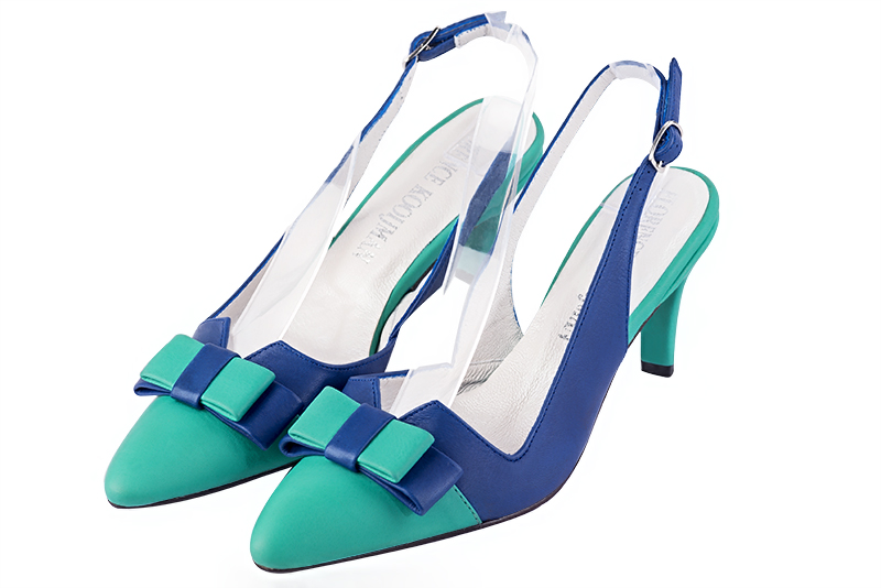 Aquamarine blue women's open back shoes, with a knot. Tapered toe. Medium slim heel. Front view - Florence KOOIJMAN